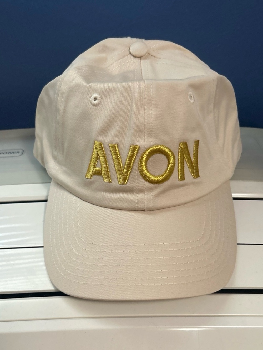 The Avon 1886 Cap is a unisex adjustable strapback hat made from 100% cotton